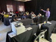 Institute for Industrial Solutions Chief Executive Officer (CEO) and Technical Trainer Osric Forrest and SSS stevedores on Friday on the first day of the workforce development training program.