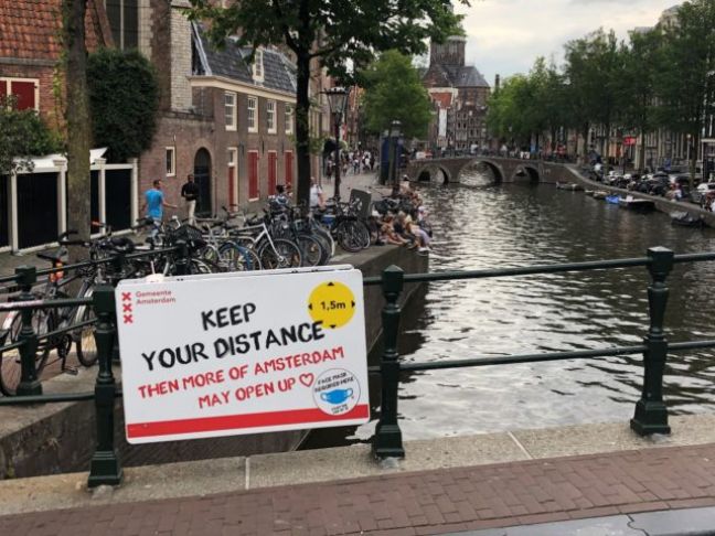 Social distancing signs in Amsterdam. Photo: S Boztas  