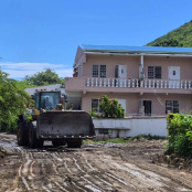 Residents collaborate to grade Beaver drive in Cay Hill